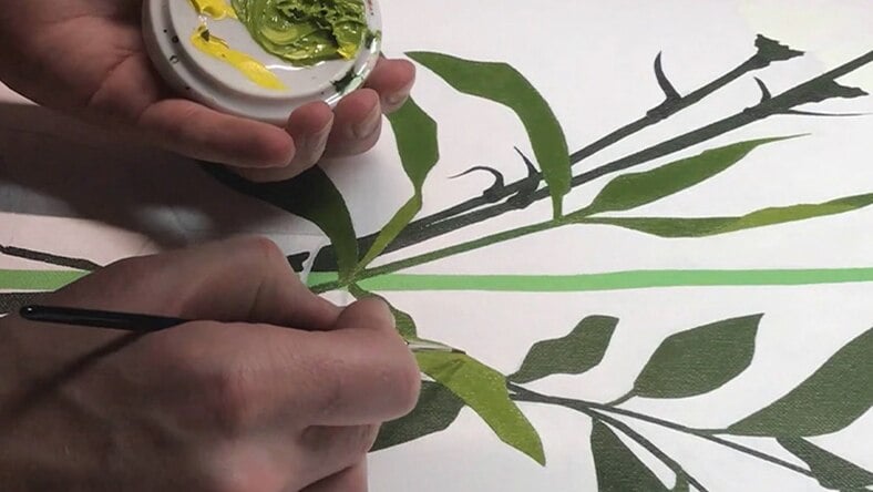 Painting leaves with a paintbrush